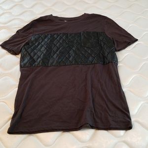 Black T-shirt with leather front pocket
